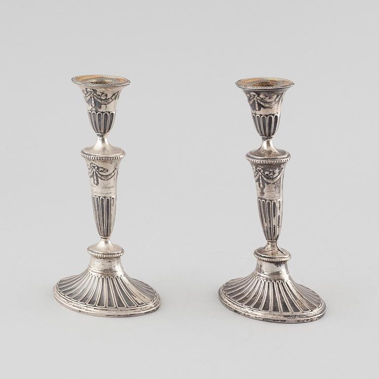 A pair of silver candlesticks from Stockholm, 1906.