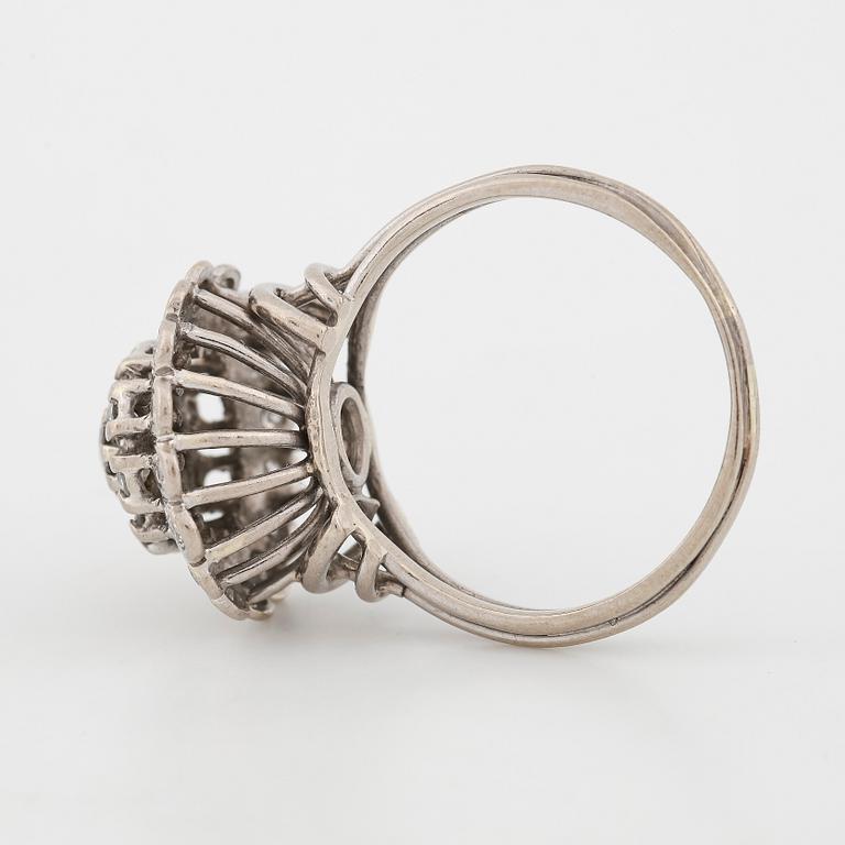 A brilliant- and single cut diamond ring.