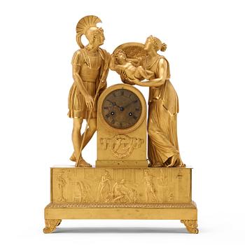 A French Empire early 19th century gilt bronze mantel clock.