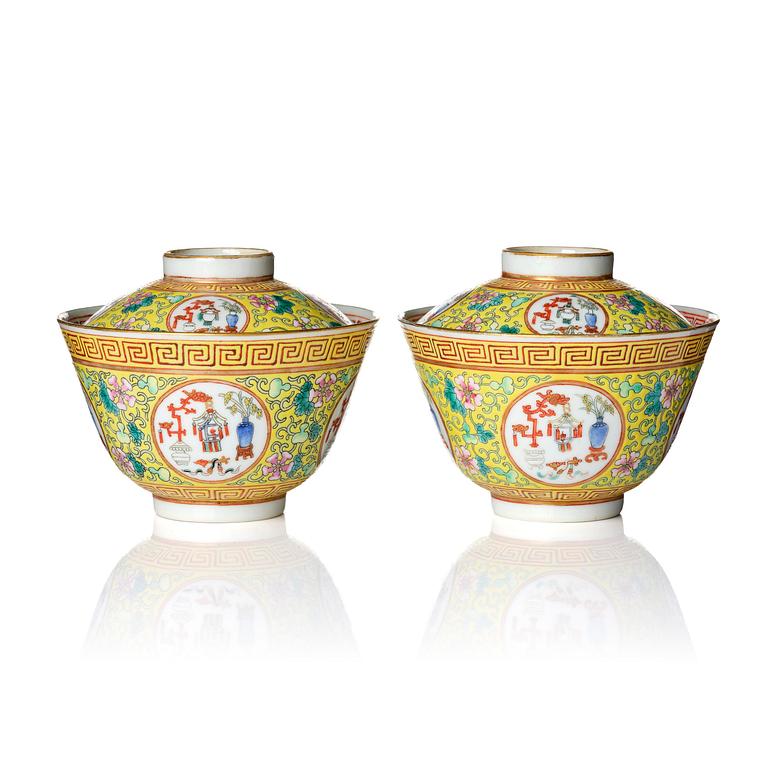 A pair of yellow ground 'medallion' bowls with covers, Qing dynasty with Daoguang mark.