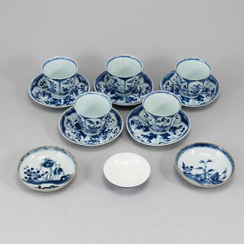 A group of eight blue and white porcelain objects, mostly 18th century.