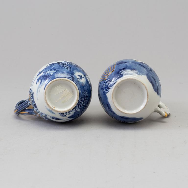 Two blue and white milk jugs with covers, Qing dynasty, Qianlong (1736-95).