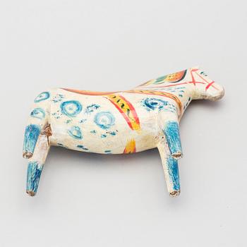 A painted folk art dala horse first half of the 20th century.