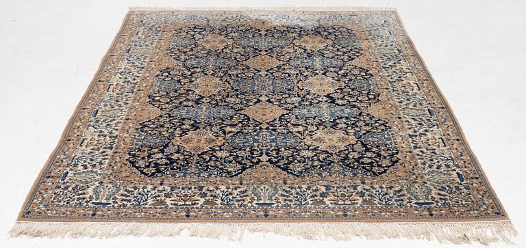 A semi-antique Nain carpet, part-silk, c. 261 x 175 cm.