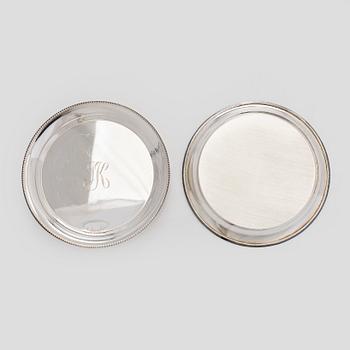 A set of 12 silver glass coasters, Auran Kultaseppä Oy Turku 1935 and 1983, and cocktail sticks, 12 pcs silver.