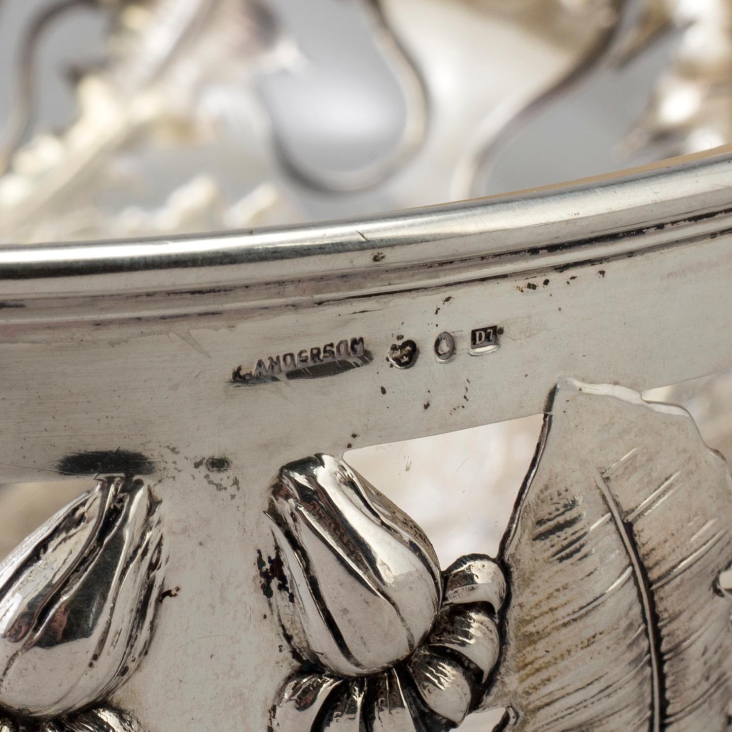 A Swedish Art Nouveau silver bowl with glass insert, decorated with dandelion, maker's mark K Anderson Stockholm 1906.
