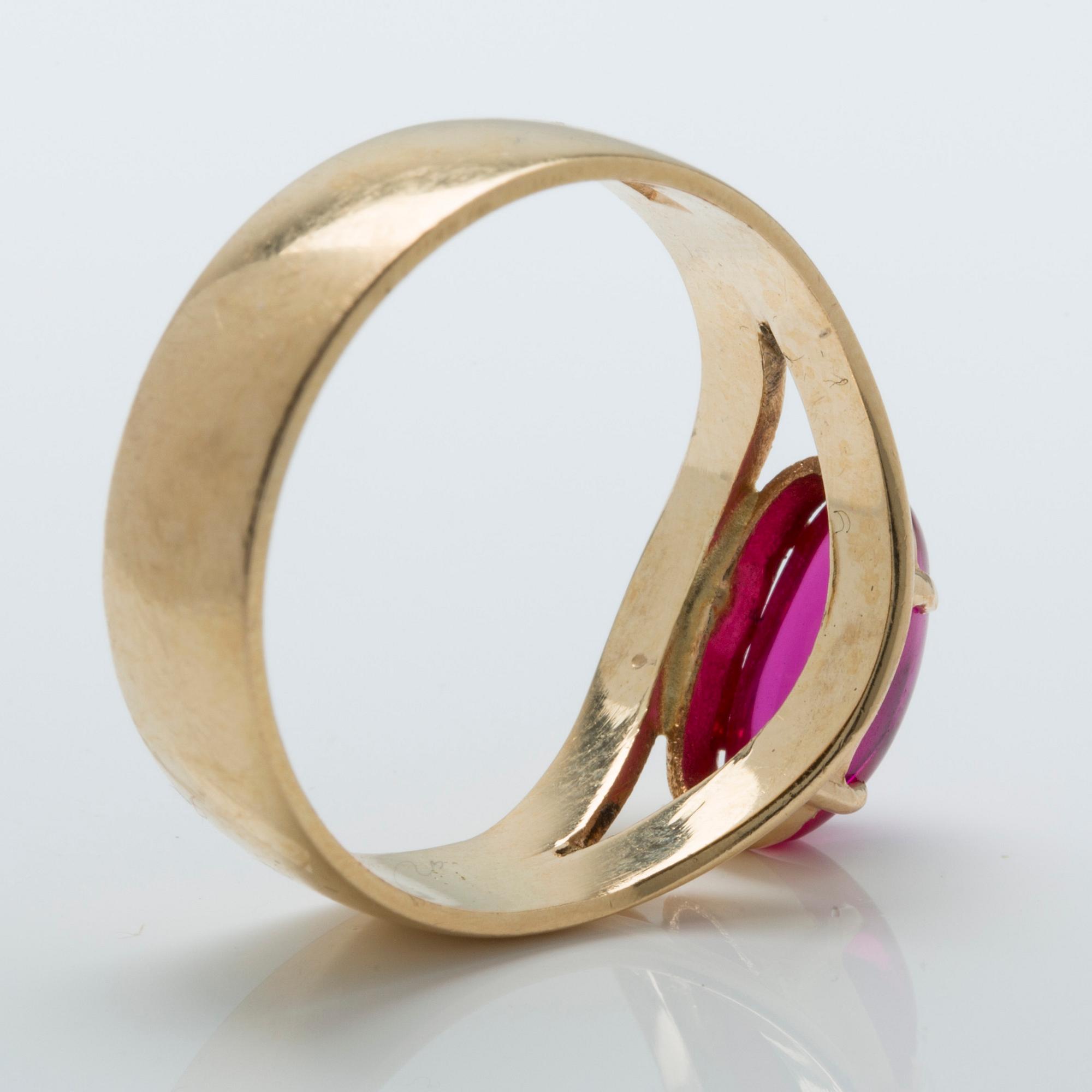 A cabochon-cut ruby ring.