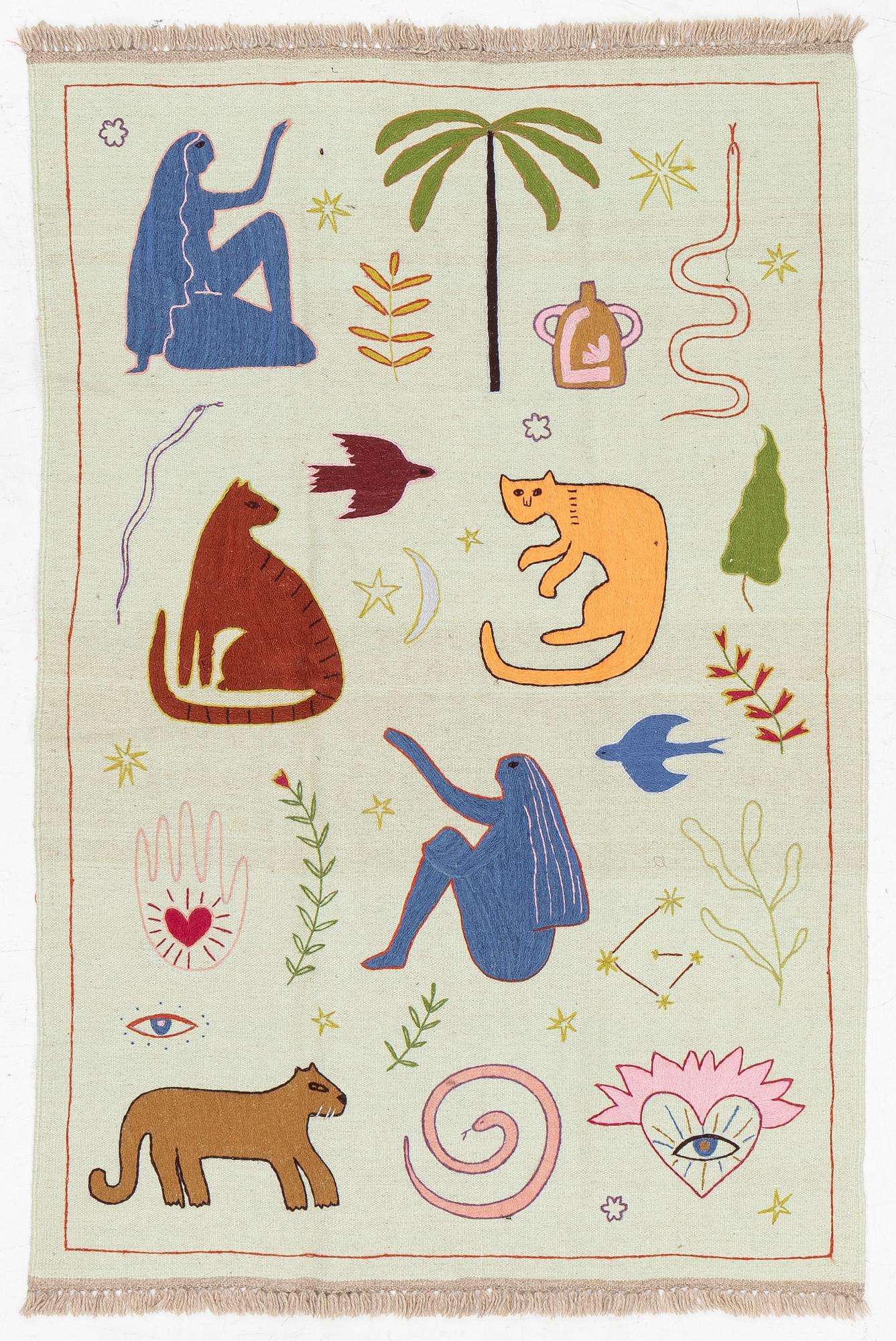 A hand-embroidered kilim rug, c. 186 x 125 cm.