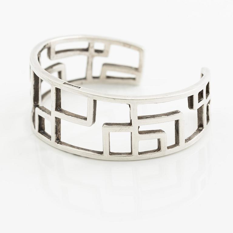 Claës E. Giertta, a ring and a bangle, silver, Stockholm 1961 and 1965.