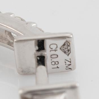 Brilliant cut diamond hopp earrings.