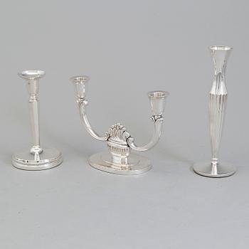 A set of three silver candlesticks, 20th century.