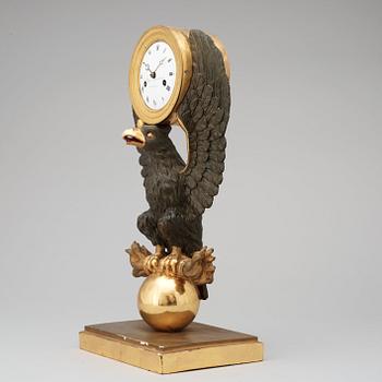 A Swedish Empire mantel clock, by E. Engelbrechten.
