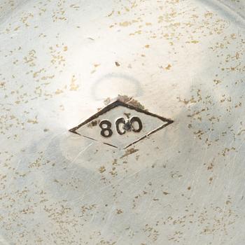 Two pierced silver bowls and two sugar spoons, including Sweden and Endland, 20th century.