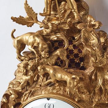 A Louis XV mid 18th century gilt bronze wall clock, "Chasse", in the style of J J de Saint Germain,