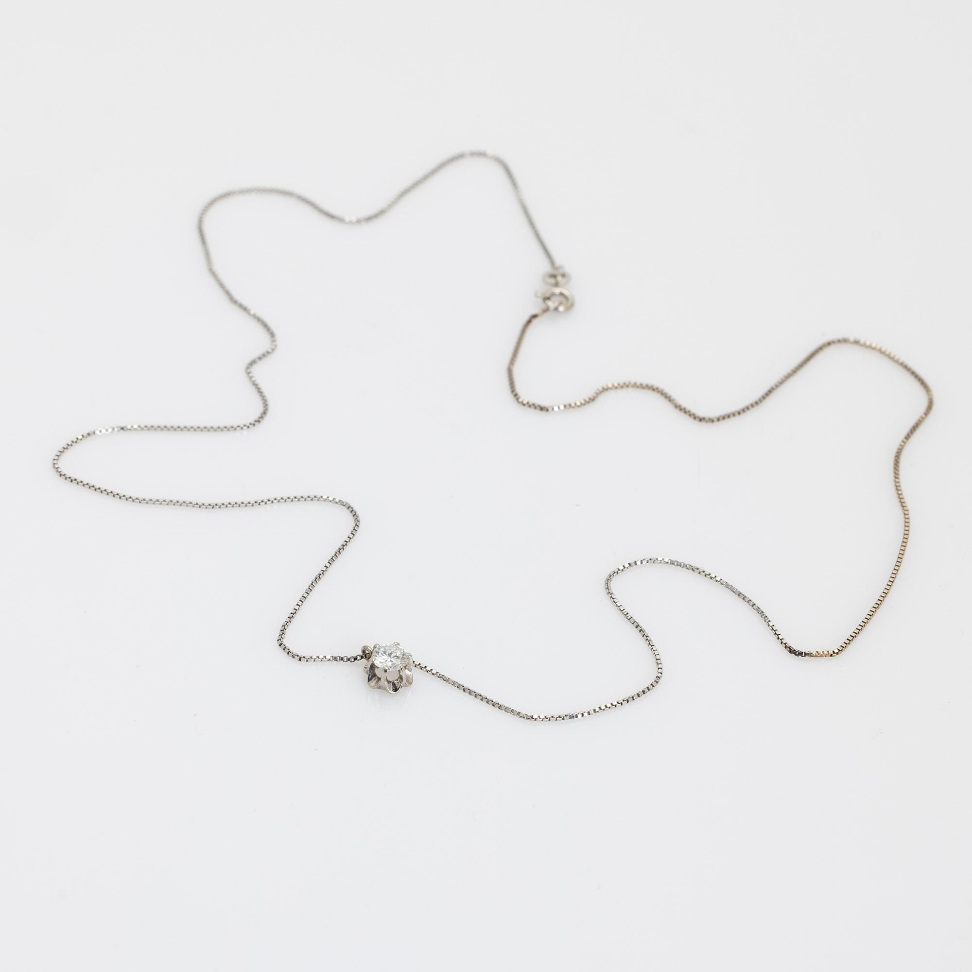 Collier, 18K vitguld med diamant.