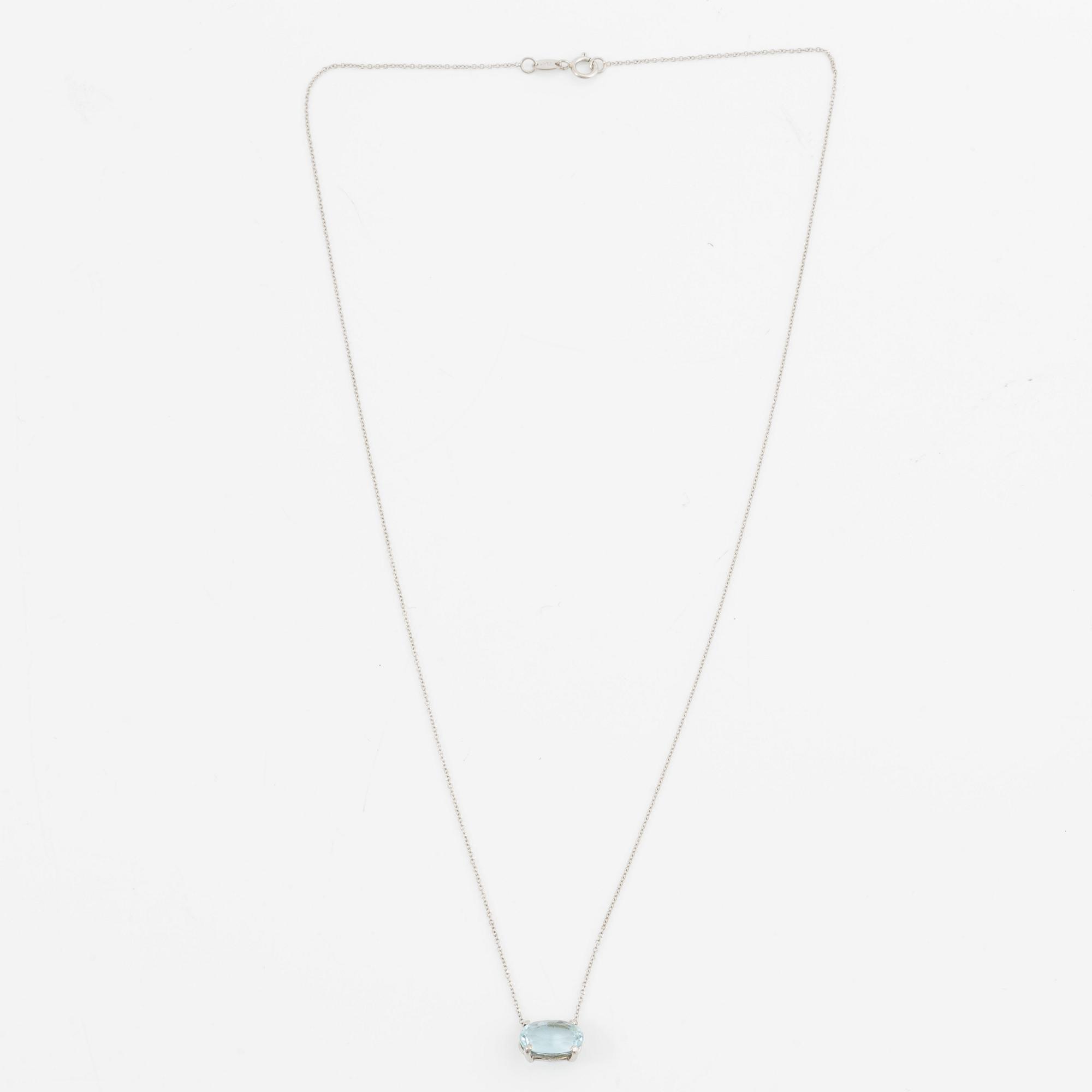 Necklace, 18K white gold with oval-cut aquamarine.