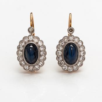 A pair of 14K gold earrings with sapphires and diamonds ca. 0.51 ct in total. A R Weckman, Helsinki 1925-50.