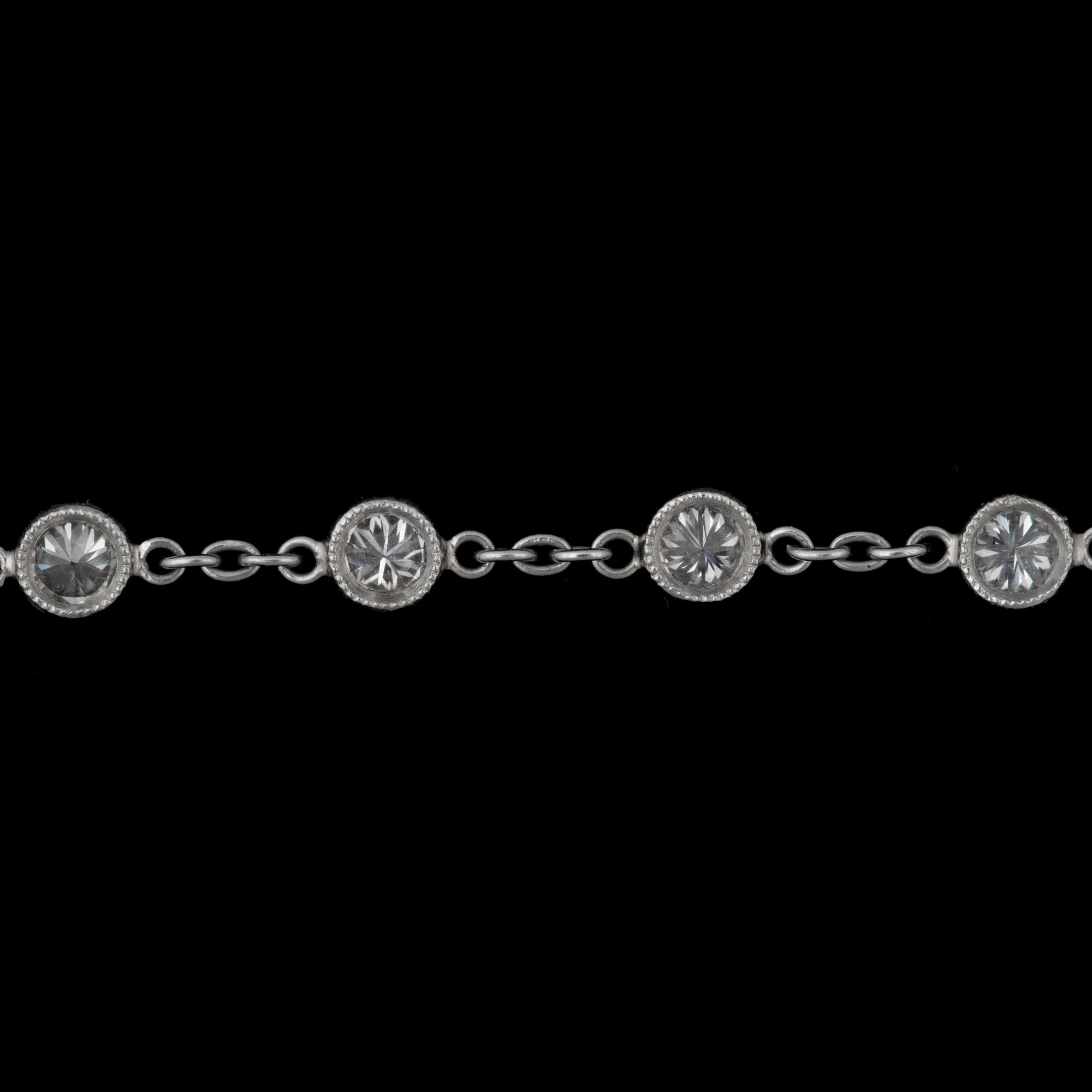 A diamond necklace, "diamonds by the yard", tot 13.60 cts.