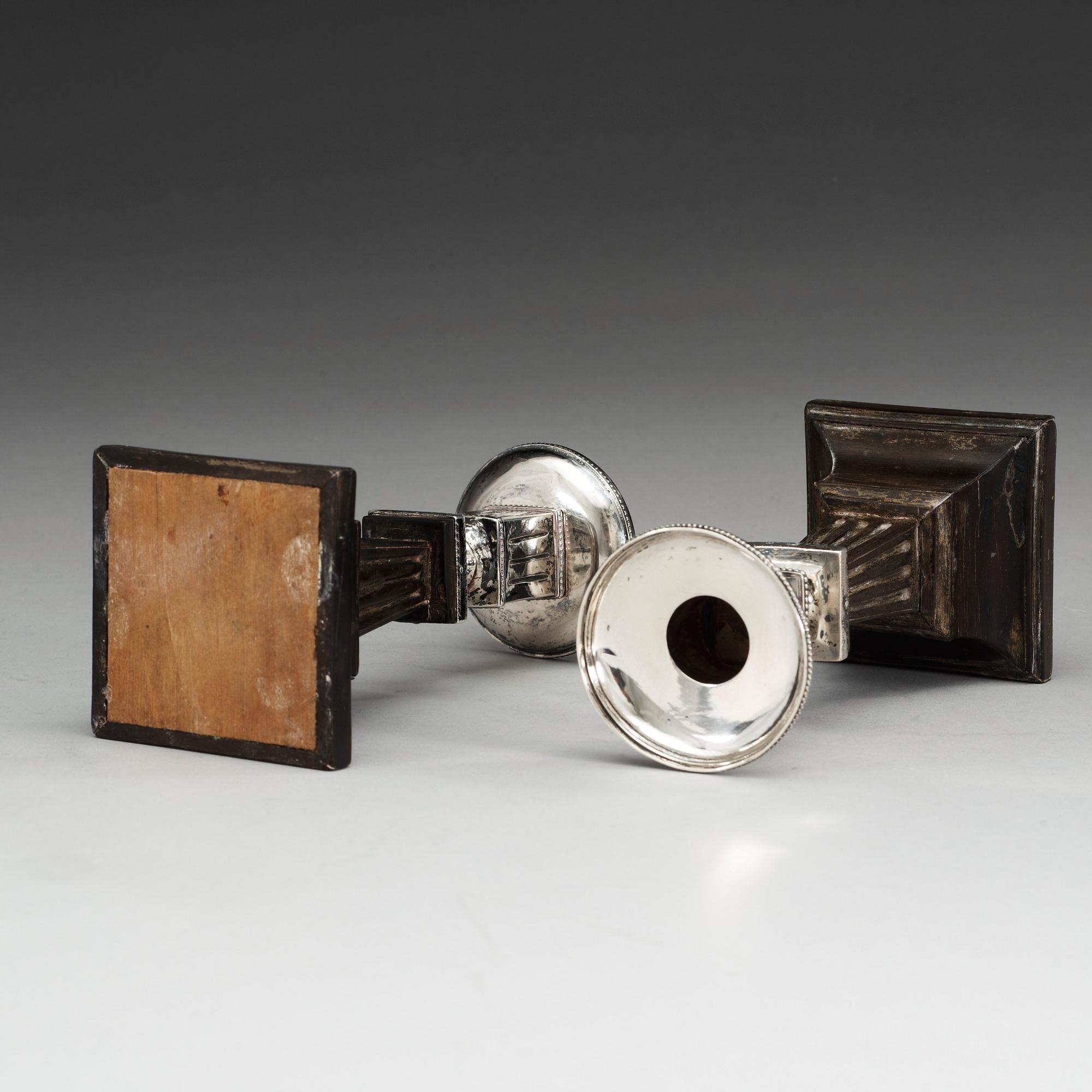 A pair of Swedish early 19th century silver and wood candlesticks, marks of Lorenz Georg Weis, Norrköping (1791-1829).