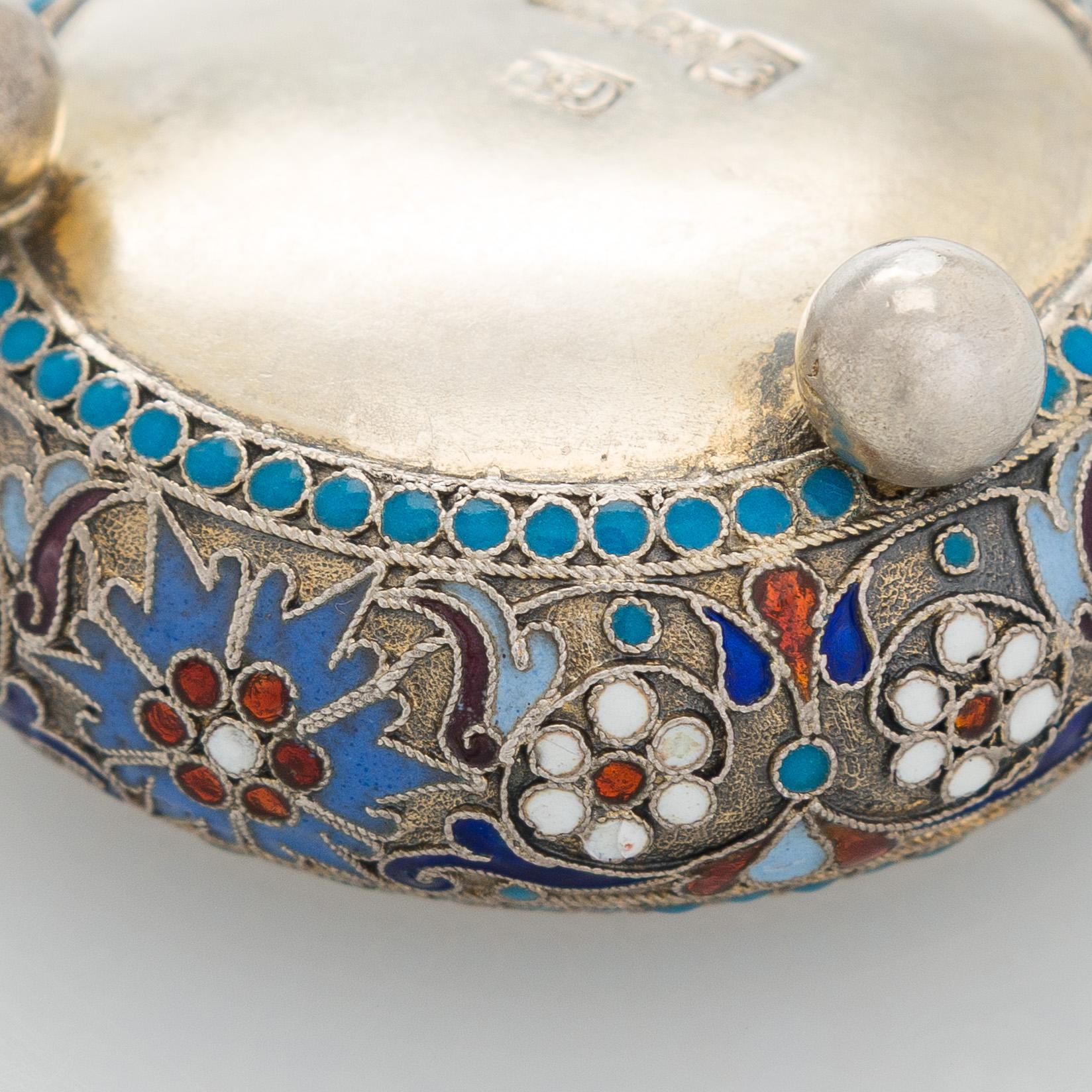 A silver parcel-gilt, cloisonné enamel salt cellar, 1890s.