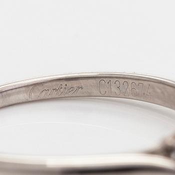 Cartier, ring, platina med briljantslipad diamant ca 0.46 ct. Med GIA dossier.