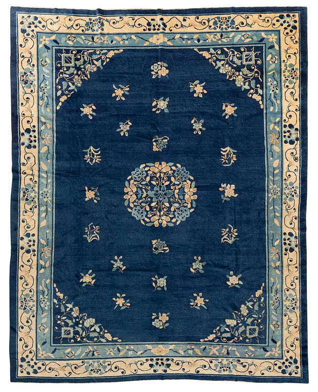 An antique Peking (Beijing) carpet, North China, c. 340 x 275 cm.