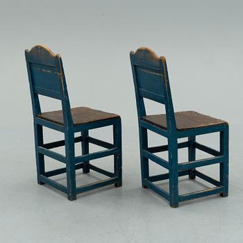 a pair of early 20th century chairs.