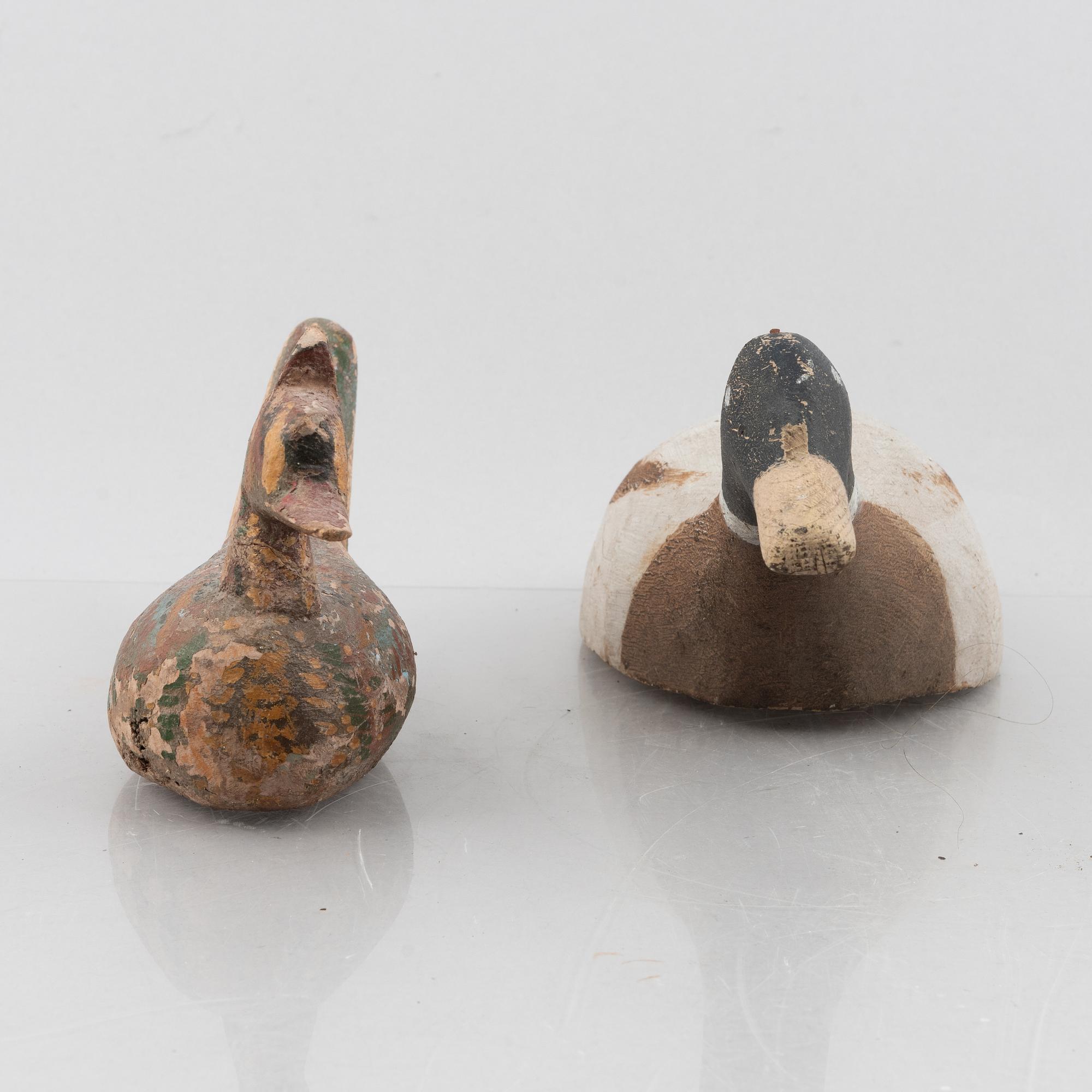 A set of six wooden duck decoys, 20th century.