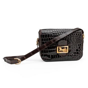 617. CÉLINE, a brown crocodile embossed leather shoulder bag.