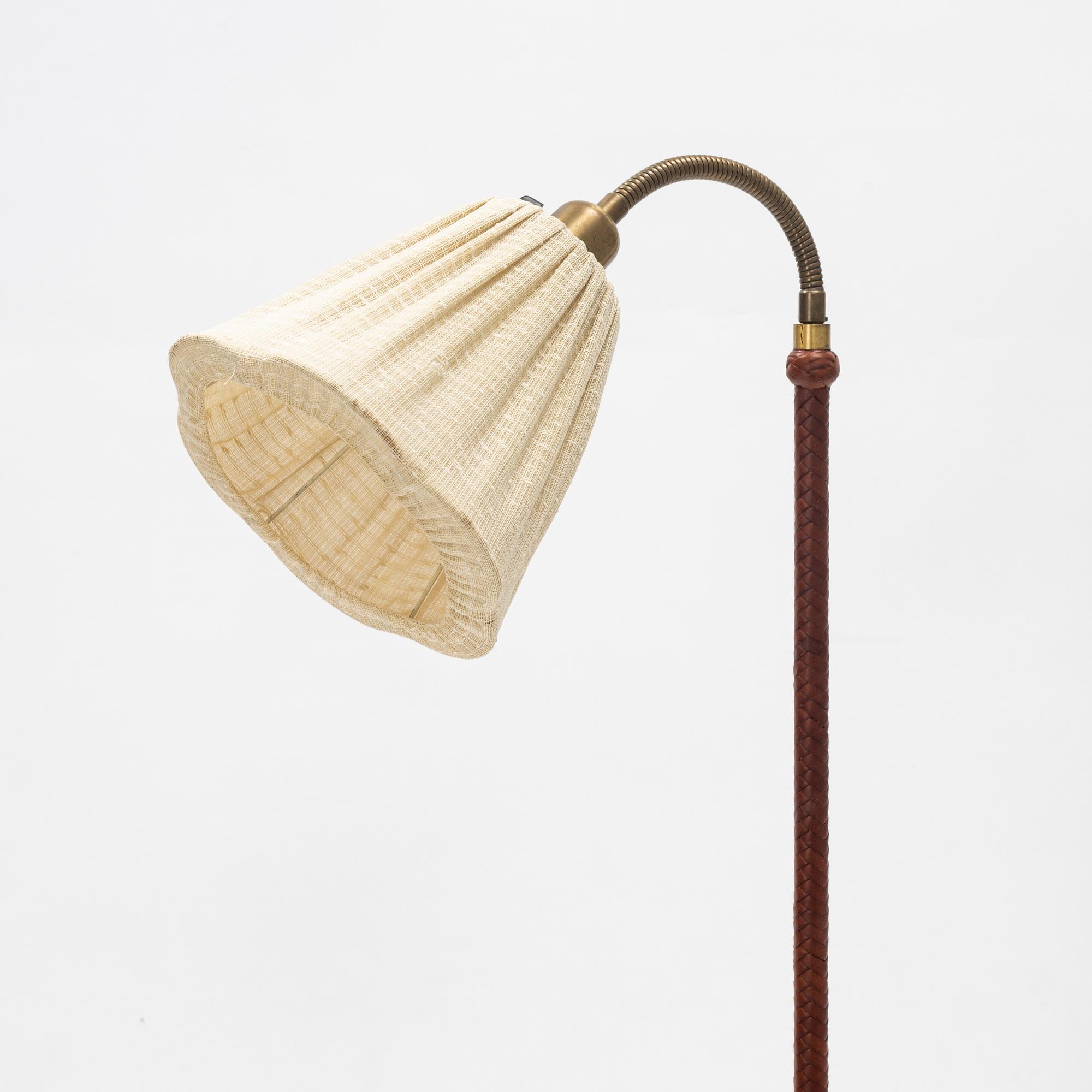 A mid 20th Century floor lamp from ASEA , mid 20th Century.