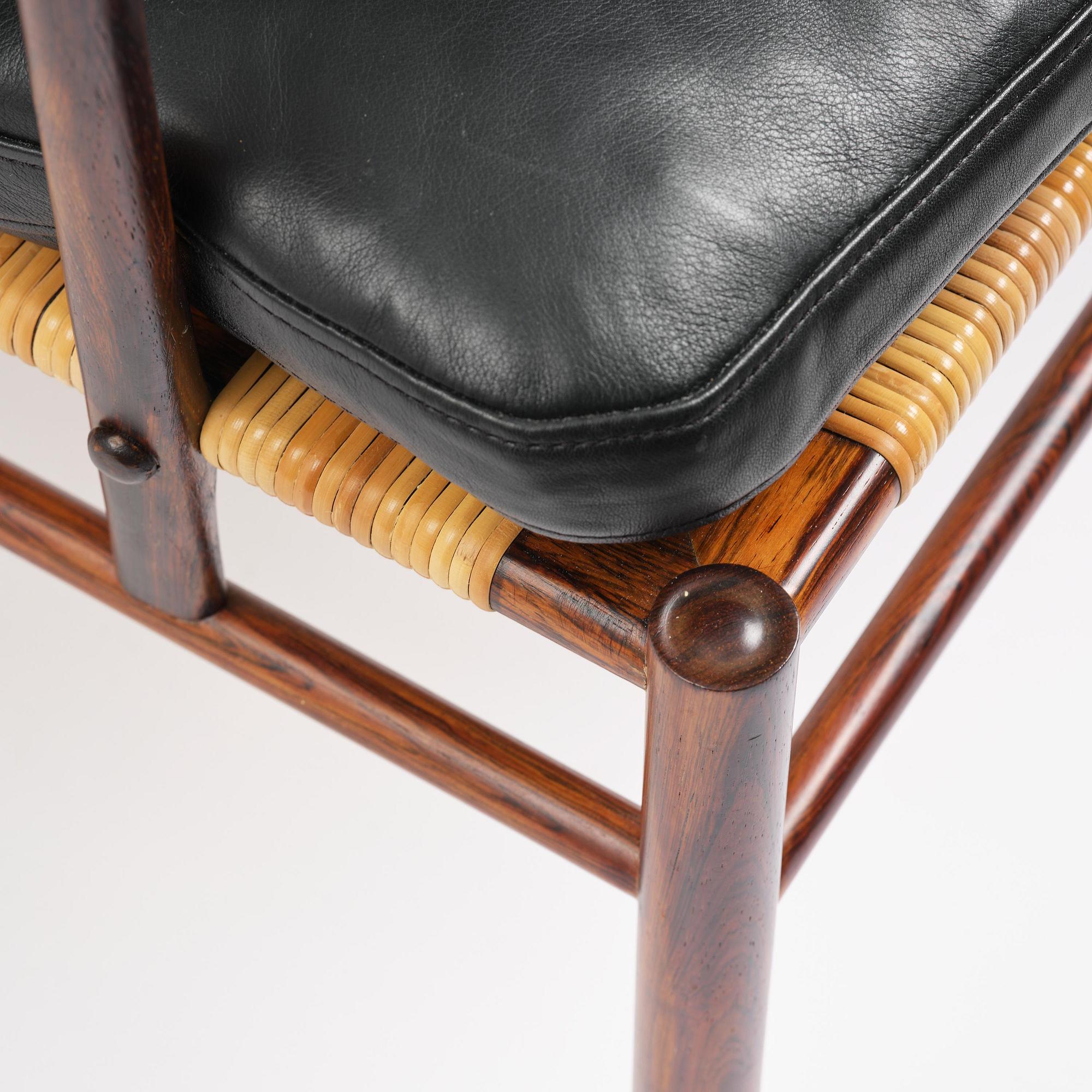 Ole Wanscher, an early pair of rosewood "Colonial Chair" model PJ 149, Poul Jeppesen, Denmark, ca. 1950.
