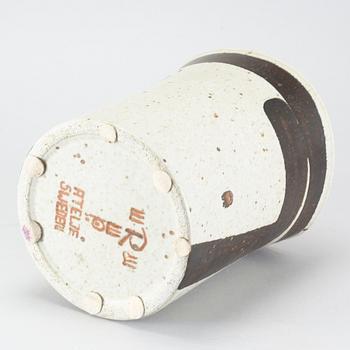 A stoneware flower pot by Inger Persson for Rörstrand Ateljé.