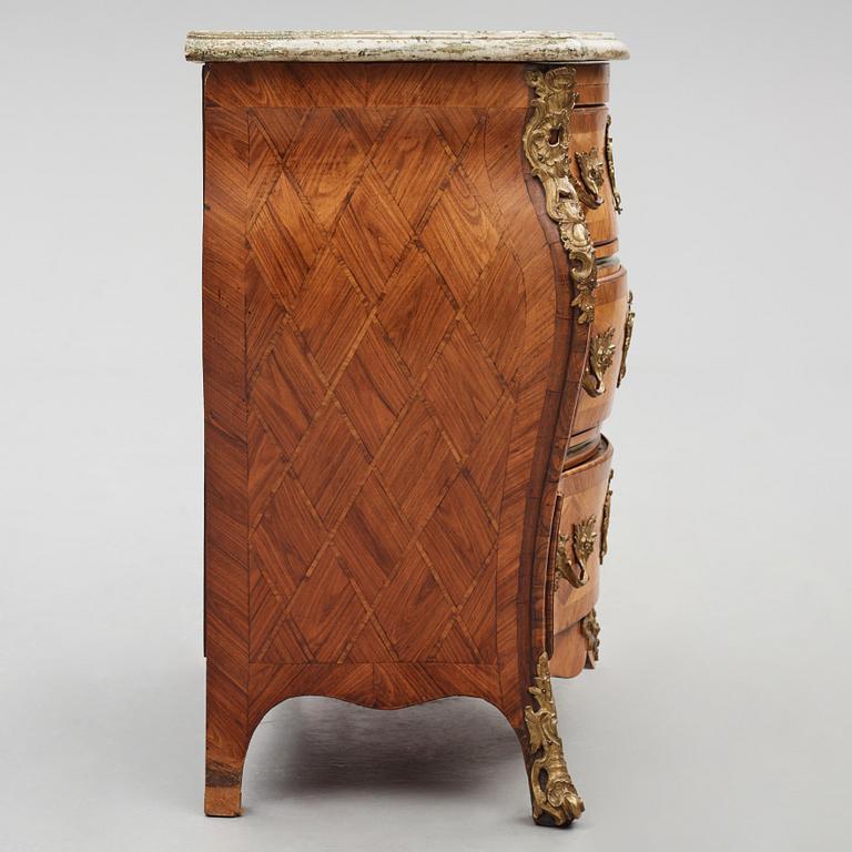 A rococo parquetry and gilt-brass mounted commode by C. Linning (master 1744-1779).