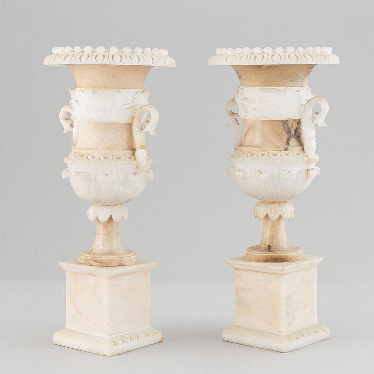 A pair of 20th century alabaster vases.