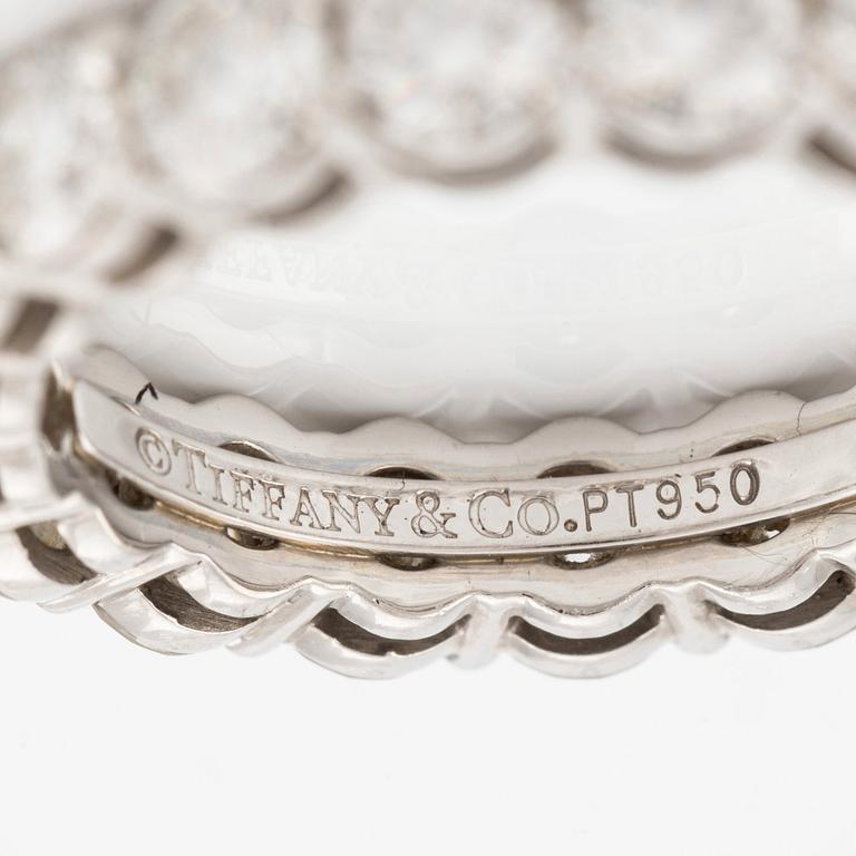 A platinum Tiffany & Co eternity ring set with round brilliant-cut diamonds.