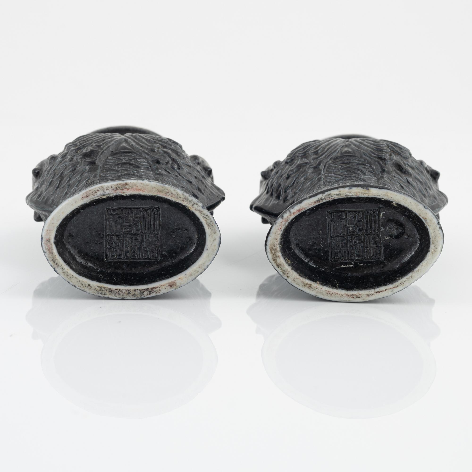 A pair of Chinese double dragon-fish vases with seal marks, 20th Century.