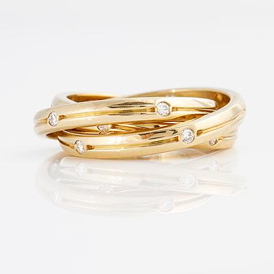 A brilliant-cut diamond "Trinity" Cartier ring.