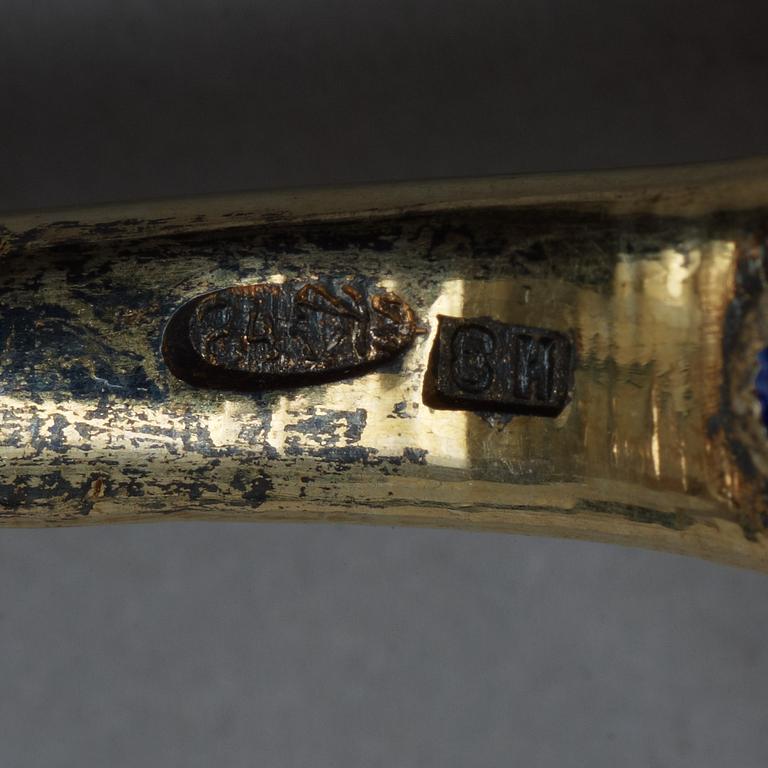 A Russian early 20th century silver-gilt and enamel cane-spoon, unidentified makers mark Moscow 1899-1908.