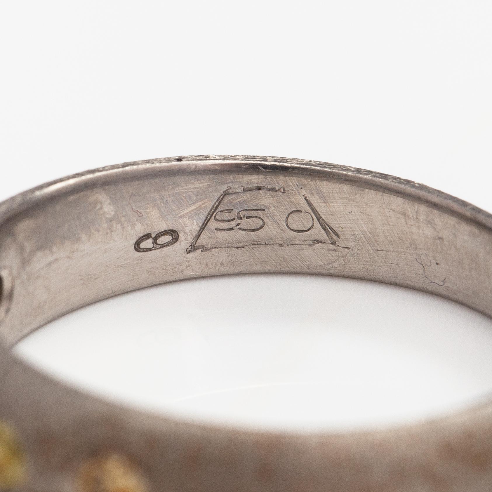 A palladium ring with diamonds ca. 0.25 ct in total.