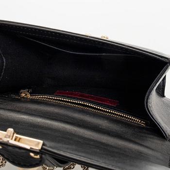 Valentino Garavani, a 'Glam Lock' bag.