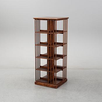 A 21st Century oak revolving bookcase.