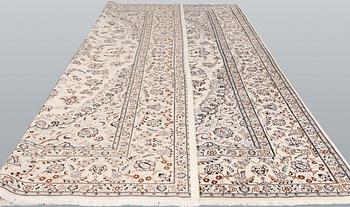 A Nain part-silk carpet, 395 x 293 cm.