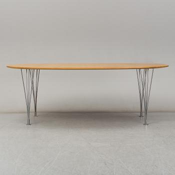 PIET HEIN & BRUNO MATHSSON, a curly birch veneered 'Superellips' table from Mathsson International.