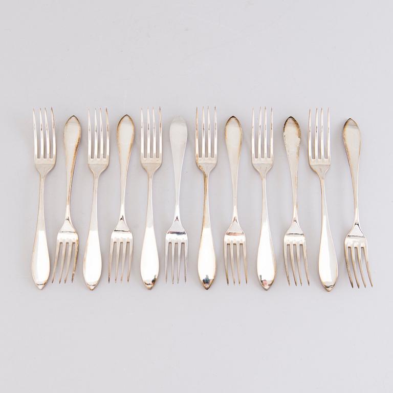 A 1920s 88-piece set of silver cutlery and 12 knife handles, Warsaw Poland.