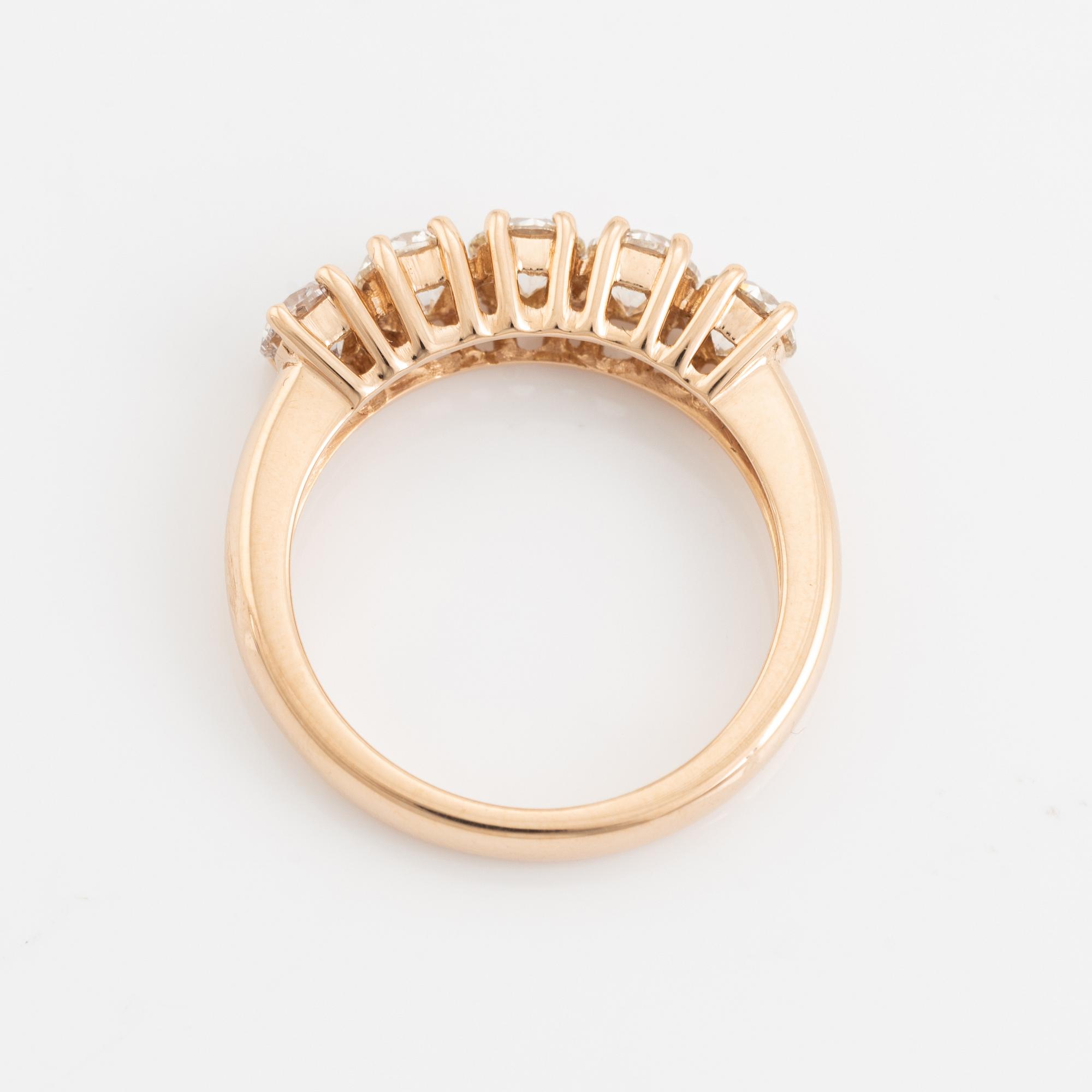 Brilliant cut diamond five stone ring.