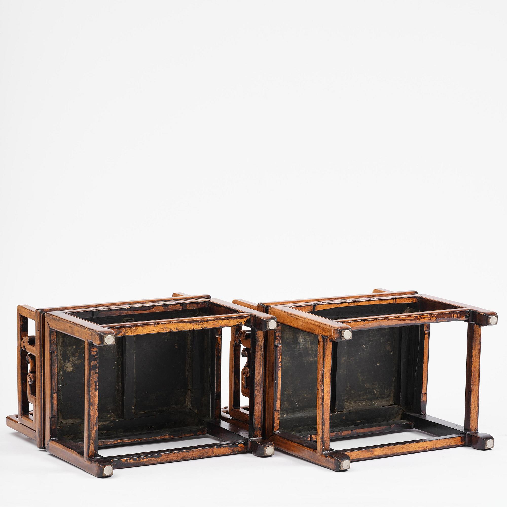 A pair of hardwood armchairs, late Qing dynasty.