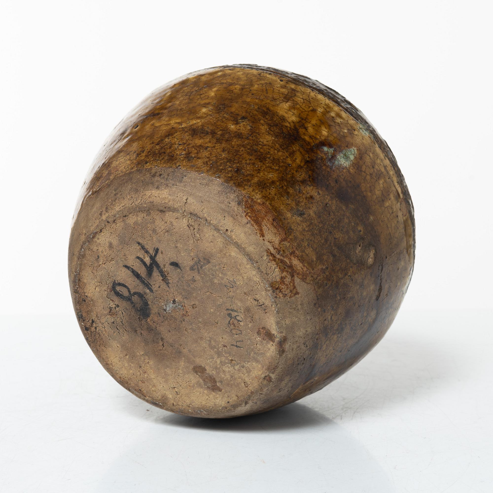 A glazed jar, Southeast Asia, 17th century.