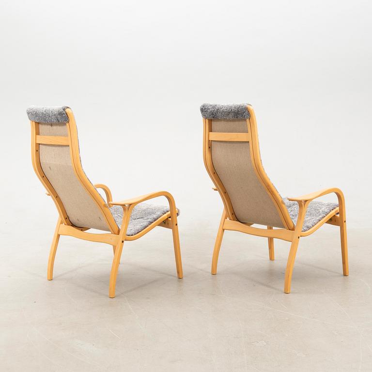 Yngve Ekström, a pair of "Lamino" armchairs for Swedese, late 20th century.