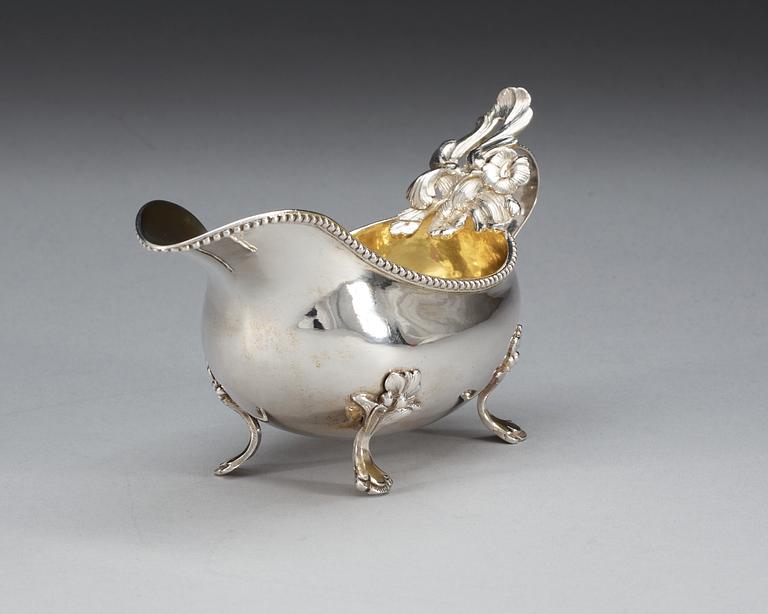 A Swedish 18th century parcel-gilt cream jug, makers mark of Peter Johan Zetterling, Linköping 1789.