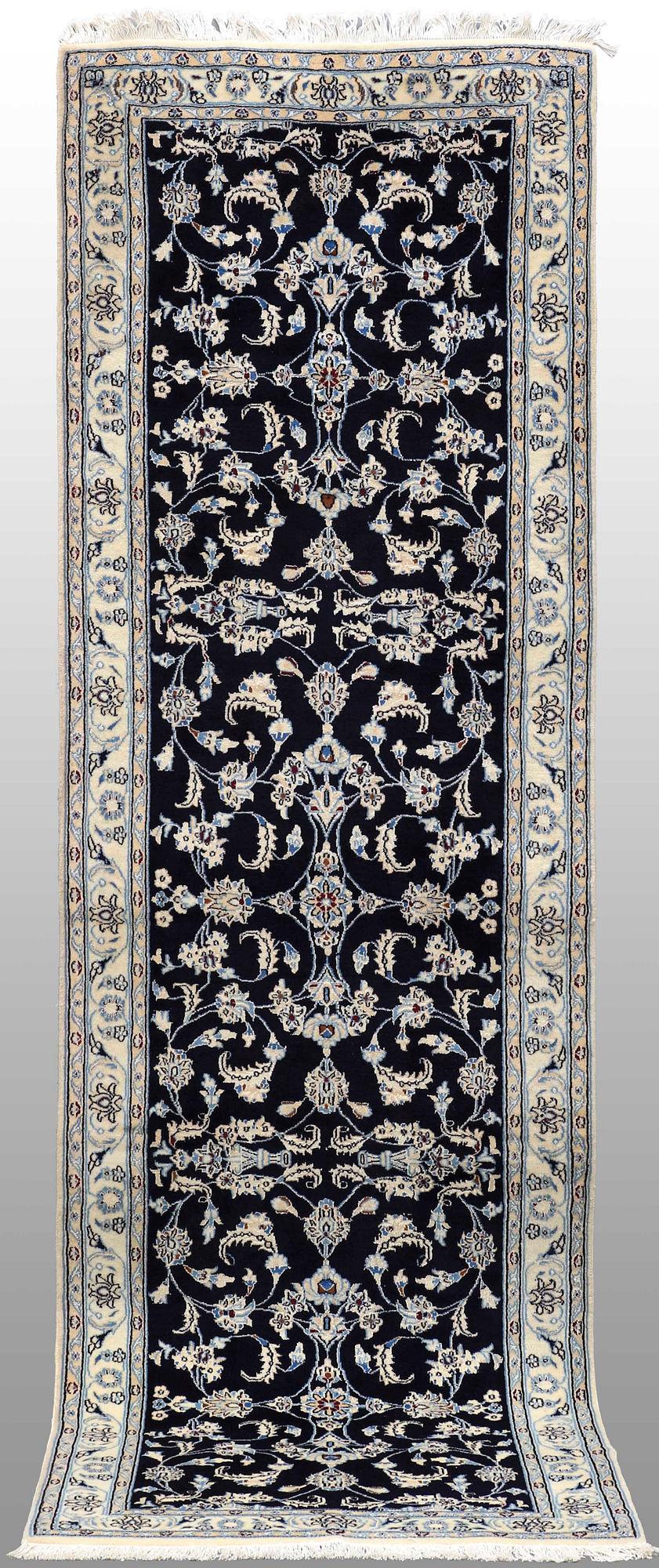 A Nain runner, part silk, approx. 294 x 90 cm.